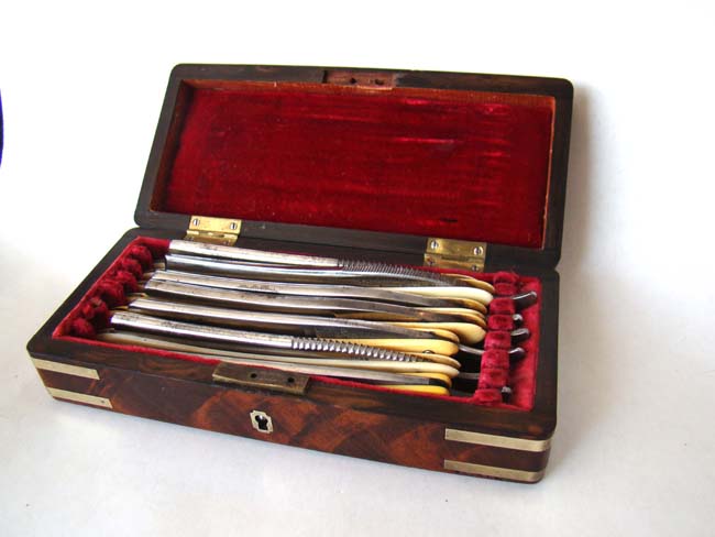 A fine cased set of seven straight edge razors with ivory and bone handles in a brass bound walnut box circa 1850 — image 4